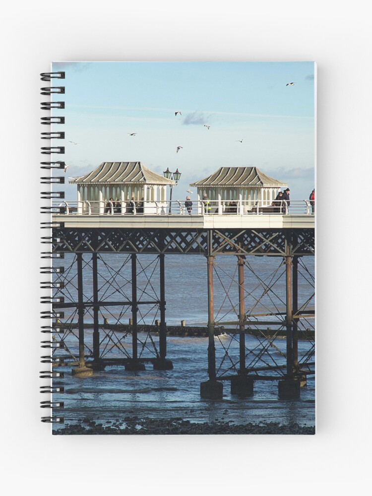 A stroll on Cromer Pier spiral notebook with cover image by MyriadLIfePhoto. Graph or lined pages inside. Buy via the image link from Redbubble.com